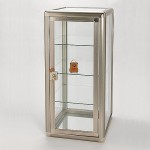 Try new styles of Countertop Displays such as this attractive tempered glass three shelf display with cam lock.